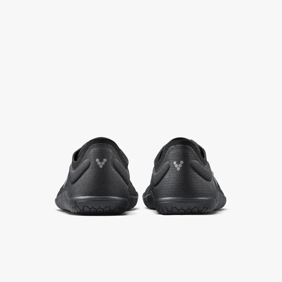 Black athletic shoes with a minimalist design on a white background