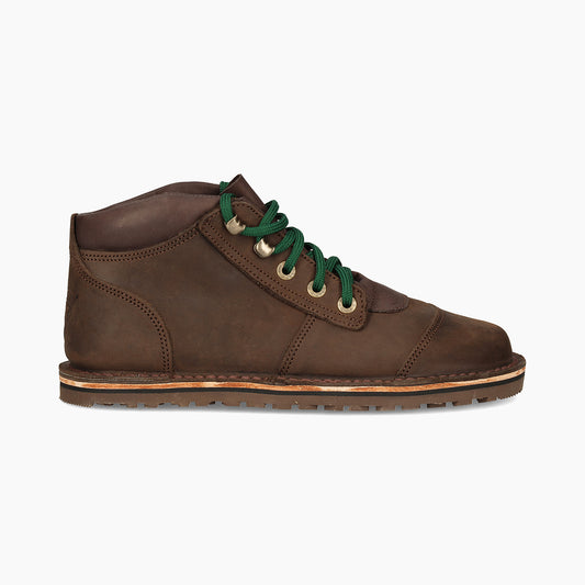 Brown leather shoe with green laces on a white background